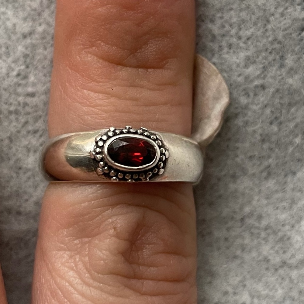 Silver and garnet ring